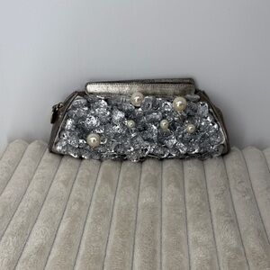 Elegant Silver Clutch with Pearl Accents